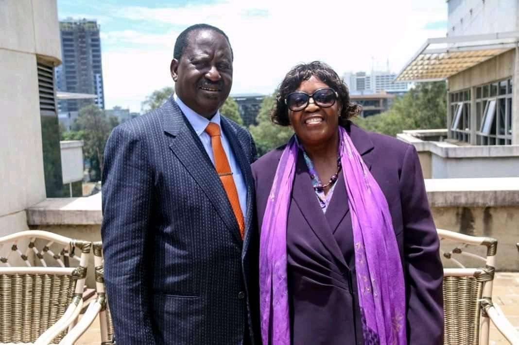 Raila Odinga standing with his sister Beryl Achieng in an earlier photograph.