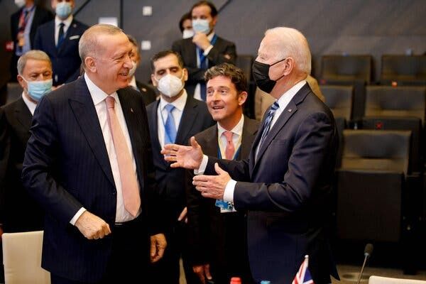 President Biden speaking with President Recep Tayyip Erdogan of Turkey at the NATO summit in Brussels on Monday.