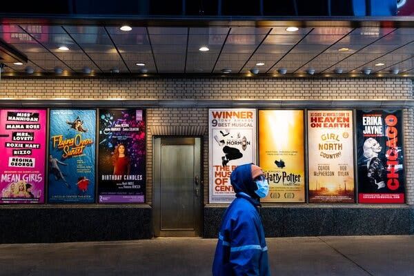 Theater posters near Times Square in mid-March.Â Broadway producers and a labor union agreed on health protocols for touring shows.