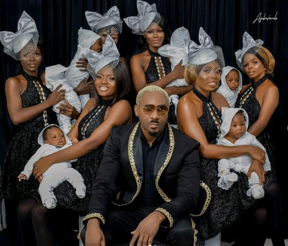 Nigerian socialite and businessman, Pretty Mike with his six wives trending photo