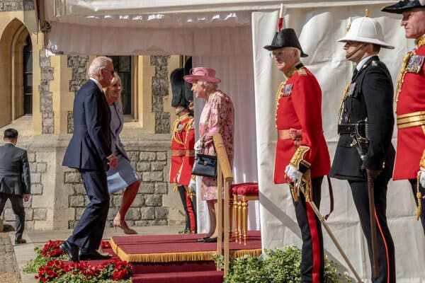 Queen Elizabeth II of Britain greeting President Biden and Jill Biden at Windsor Castle on Sunday.