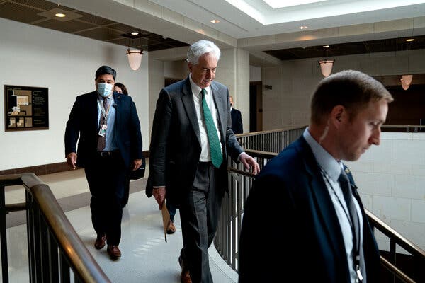 William J. Burns, center, in Washington in May.