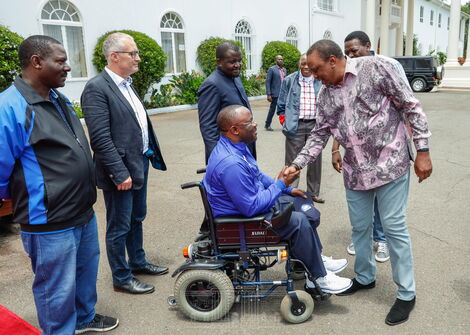 President Uhuru Kenyatta shakes hands with Westlands MP Tim Wanyonyi at State House Grounds on March 7, 2020.