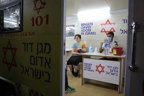 At a vaccination site in Tel Aviv, Israel, on Monday. Israel will send about 700,000 expiring doses to South Korea.