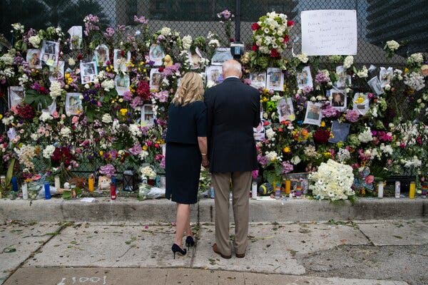 President Joe Biden and First Lady Jill Biden paid their respects at the memorial site for the victims of the building collapse.