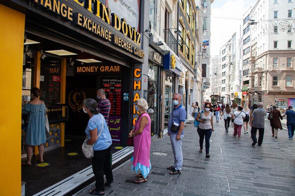 A foreign exchange shop in Istanbul. “Everything is unbelievably expensive,” one shopper said.