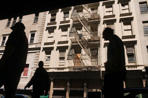 Pedestrians walking by the proposed site for an Islamic center and mosque in Manhattan in 2010.