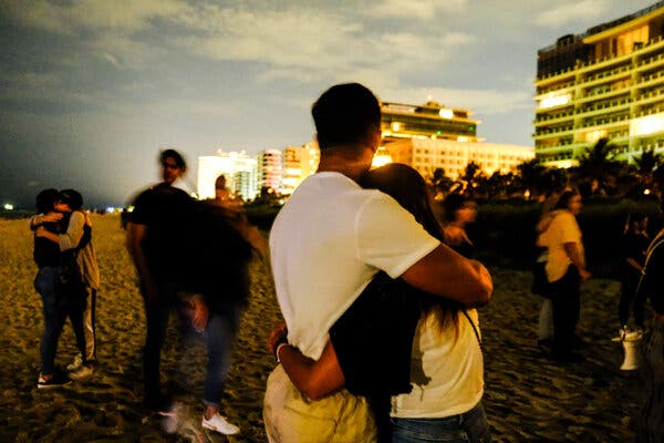 A vigil was held on Monday for the victims of the building collapse in Surfside, Fla.