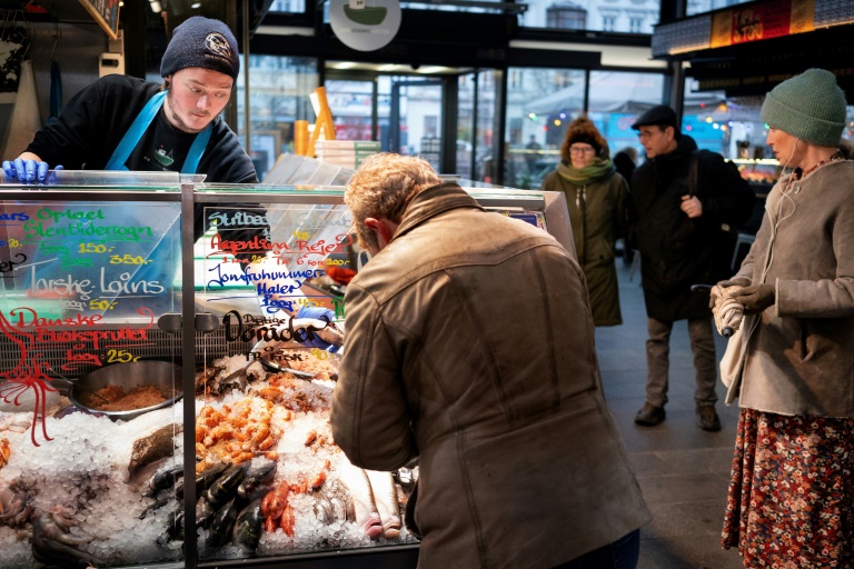 Denmark unmasks to 'live normally' again with Omicron » Capital News
