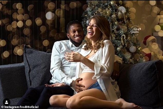 Fred and his partner posed for Instagram pictures to announce their new arrival