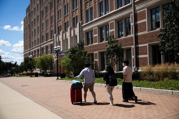 Students move back into the dorm for fall semester in August 2020 at the University of Michigan campus.