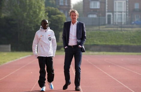 Celebrated athlete Eliud Kipchoge (left) and UK Billionaire Jim Ratcliffe at Iffley Road Sports Centre, Britain on April 30, 2019.