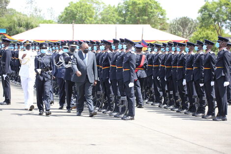 Inspector Sharon Ijeloit Oramisi Commanding final parade alongside President Uhuru Kenyatta at Kiganjo college on Wednesday January 19, 2022
