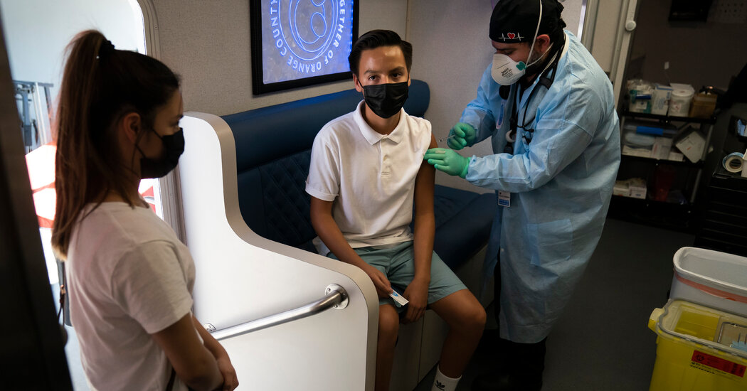Covid News Live Updates: Vaccines, Boosters and Travel Restrictions