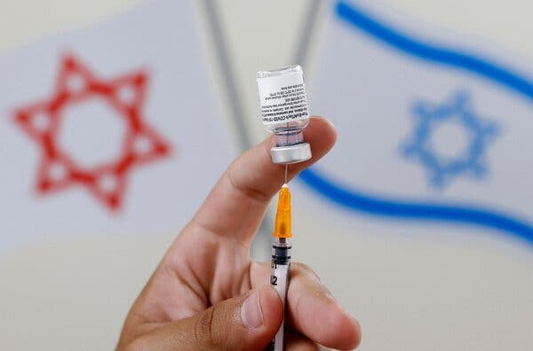 An Israeli medical worker preparing a dose of the Pfizer/BioNTech vaccine in Tel Aviv on Monday.
