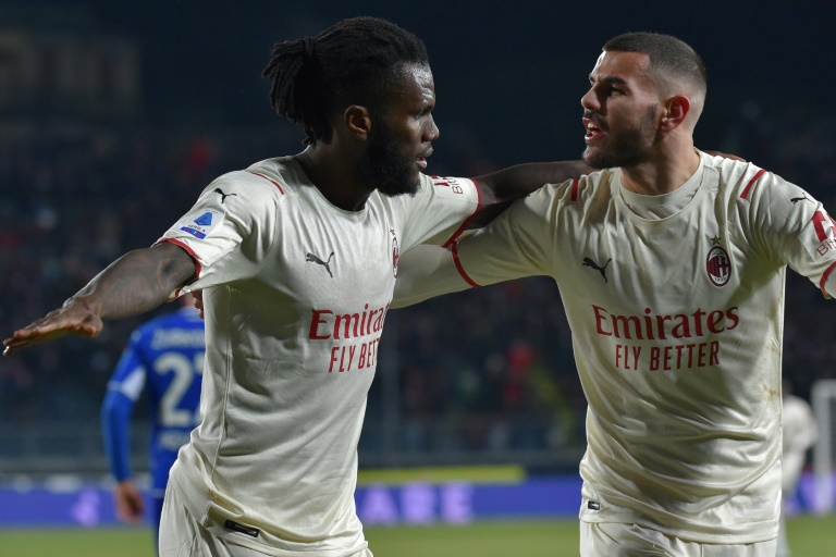 Milan keep pace with leaders Inter, Napoli stunned by Spezia