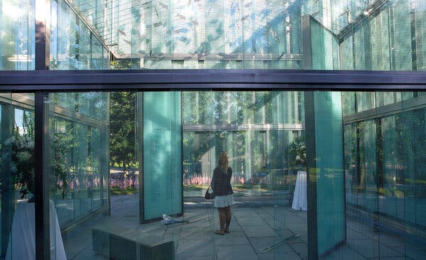 A mourner inside the 9/11 Memorial at Logan International Airport in Boston on Saturday.