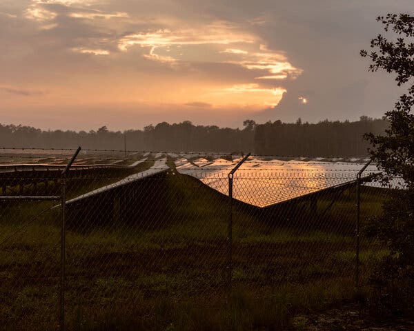 A solar farm in Fayetteville, N.C. President Biden wants to eliminate greenhouse gas emissions from the electric grid by 2035.