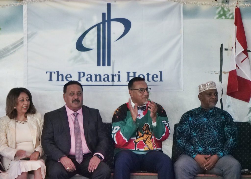 Panari Hotels General Manager Devendra Asher and Tourism CS Najib Balala watch an ice hockey exhibition game at Panari Solar Ice Rink on March 31, 2022.