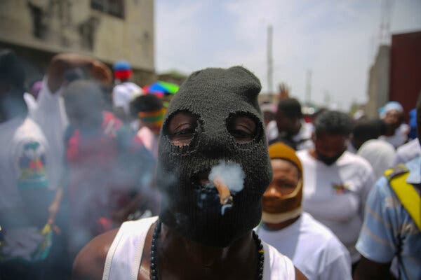 A gang member in Port-au-Prince, Haiti. The Saturday kidnappings of American Christian missionaries is the latest development as violence surges across Port-au-Prince, fueled by armed gangs.