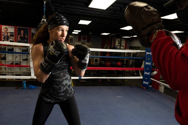 Canadian boxer Mandy Bujold training in Kitchener, Ontario, last month. Ms. Bujold, a 33-year-old flyweight, is one of Canada’s most decorated female boxers. But her bid to fight in Tokyo hit a roadblock after the qualifying tournament in Buenos Aires for boxers from the Americas was canceled.