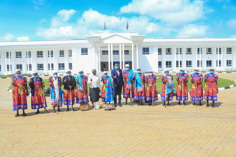 Machakos Governor Alfred Mutua poses alongside village women on Wednesday, July 14.