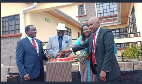 From left: Wiper leader Kalonzo Musyoka, ODM's Raila Odinga, Ida Odinga and Makau Mutua cut a cake during the opening Kitui Villa Hotel on July 10, 2018. 