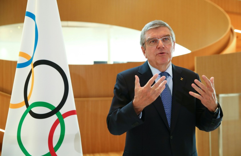 Olympic chief Bach consults with IOC members over virus fallout