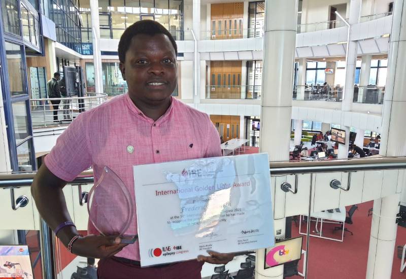 Kenya’s Fred Beuchi awarded the IBE Golden Light Award Eve woman