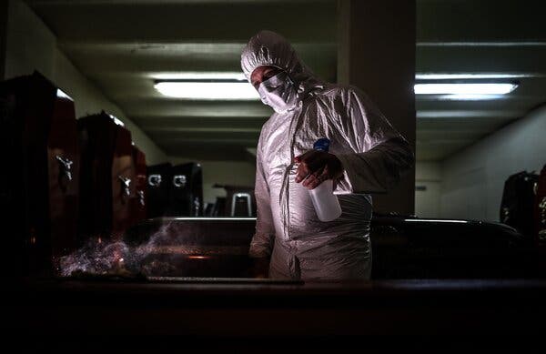 A funeral home employee sanitized coffins in Buenos Aires in early May.