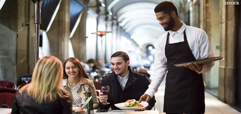 A waiter in the line of duty