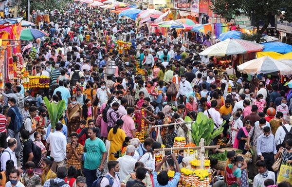 Gathering at a market in Mumbai on Thursday, a day before the start of the Ganesh Chaturthi festival.