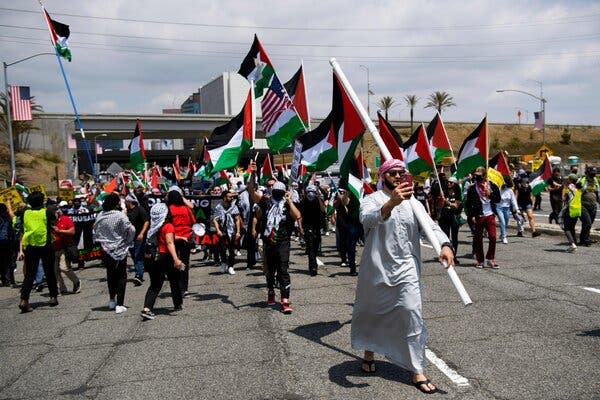Protestors marched in Los Angeles, demonstrating in support of Palestine, Saturday.