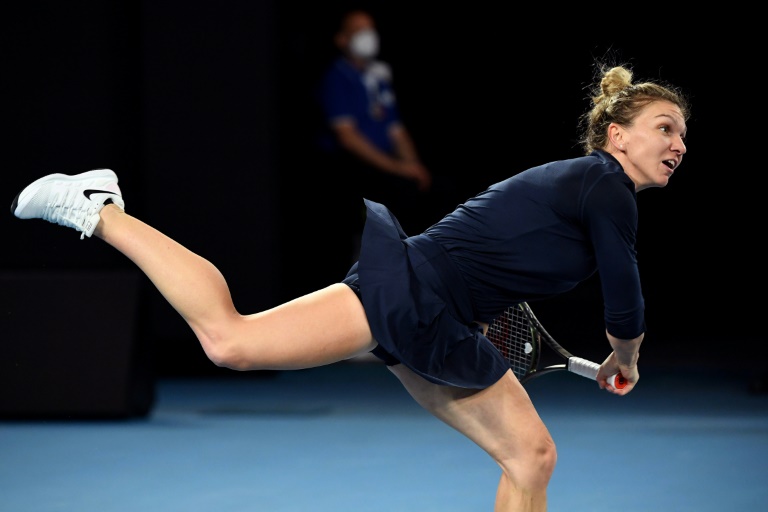 Halep wins first match since November