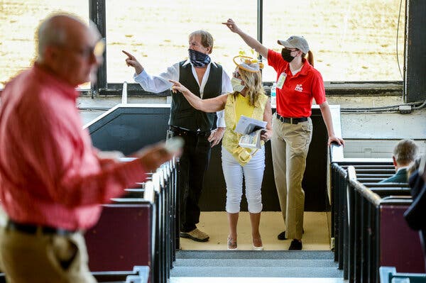 Spectators making their way to their seats as the undercard of the Preakness Stakes get underway.