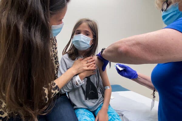 Marisol Gerardo, 9, gets a second dose of the Pfizer-BioNTech vaccine during a clinical trial at Duke Health in Durham, N.C., in April.