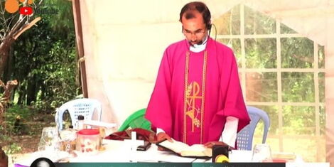 Priest delivering a sermon during the burial ceremony on Elizabeth Mueni on Saturday April 23, 2022