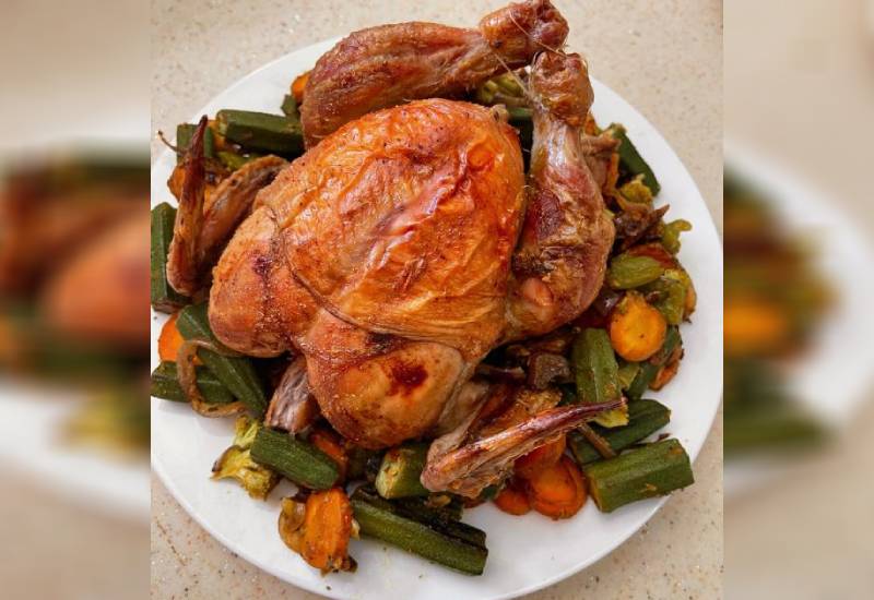 Roast chicken with sautéed veggies Eve woman