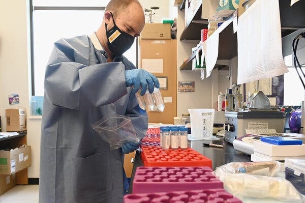 Marc Johnson, a virologist at the University of Missouri, examining samples of wastewater to track the coronavirus.