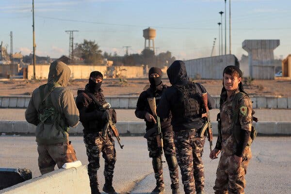 Members of the Syrian Democratic Forces at the prison in Hasaka on Tuesday.