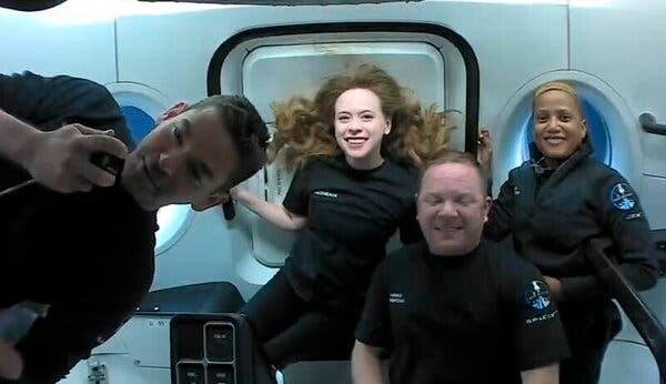 From left, Jared Isaacman, Hayley Arceneaux, Chris Sembroski and Sian Proctor, the Inspiration4 crew, during their first day in space.