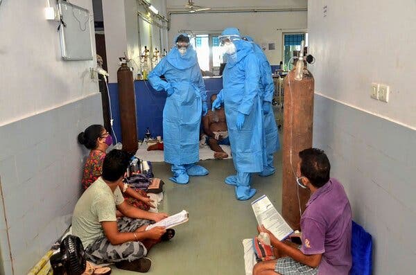 Pramod Sawant, chief minister of Goa, India, on the left and wearing personal protective gear, visited Covid-19 patients at a hospital in Panjim, a city in the state, on Tuesday.