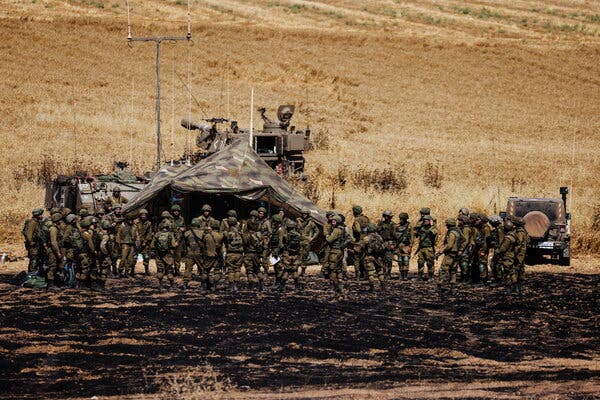 Israeli soldiers near the border between Israel and Gaza on Friday.