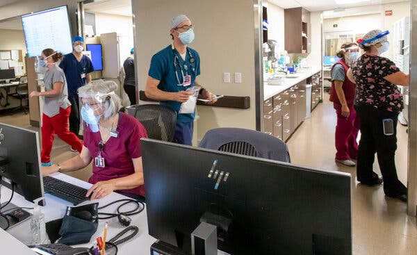 The staff works inside the Emergency Department at Asante Three Rivers Medical Center in Grants Pass, Ore. on August 19th.