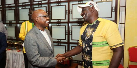 Safina Party presidential aspirant Jimi Wanjigi and his UDA counterpart William Ruto m Ruto at the Karasani Sports Complex on.jpg