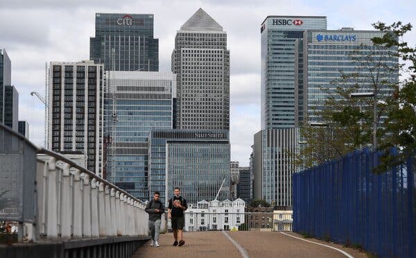 Offices at Canary Wharf in London on Wednesday. The British government aims to “showcase the benefits of returning safely to work.”