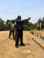 This man is no joke! DCI boss, GEORGE KINOTI, shows off his shooting skills(PHOTOs).
