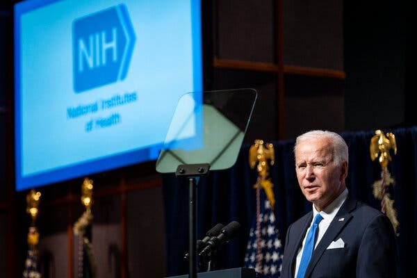 President Biden presented a new Covid strategy on Thursday, encouraging all adults to get a booster shot and seeking to expand testing.