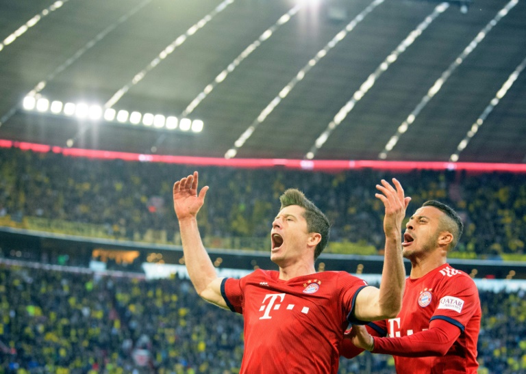Five-goal Bayern thrash Dortmund to go top of Bundesliga
