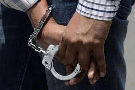 Men in handcuffs 